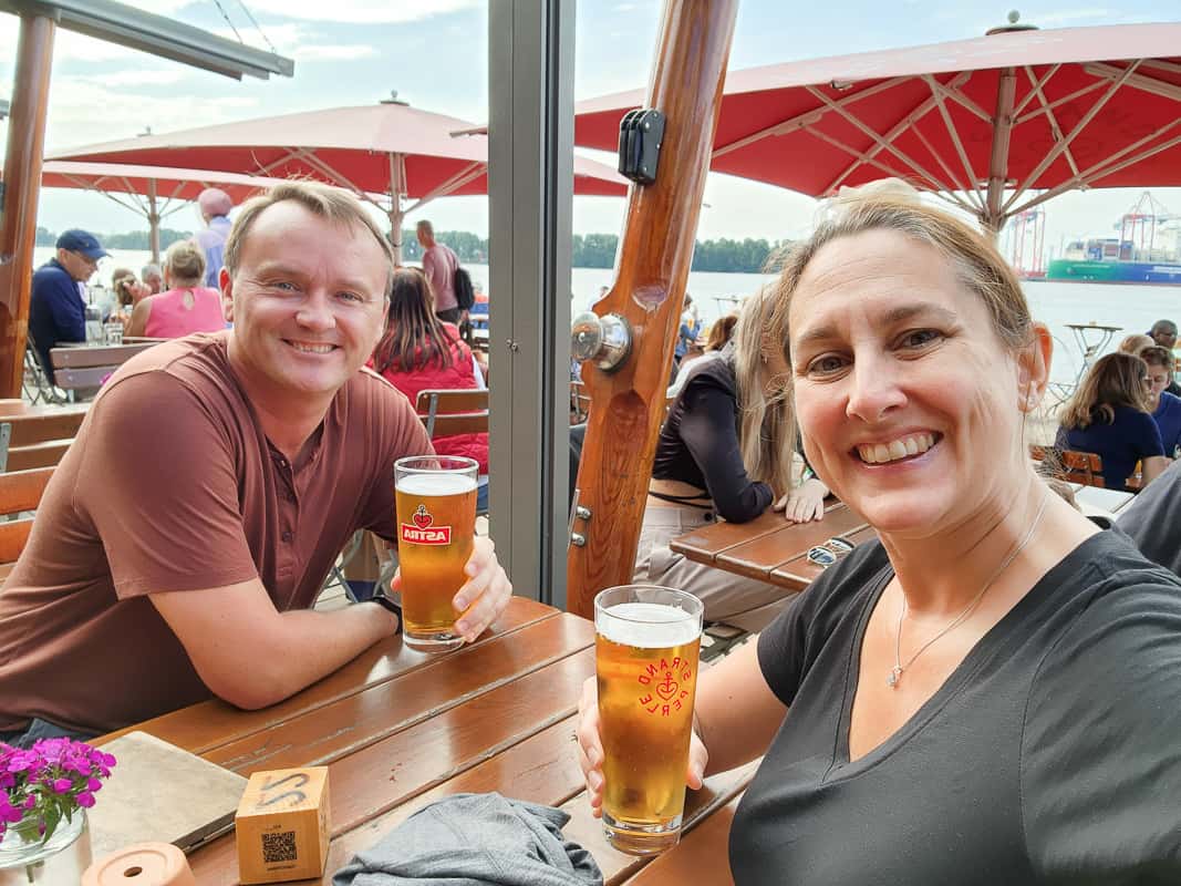 Drinking beer riverside in Hamburg, Germany