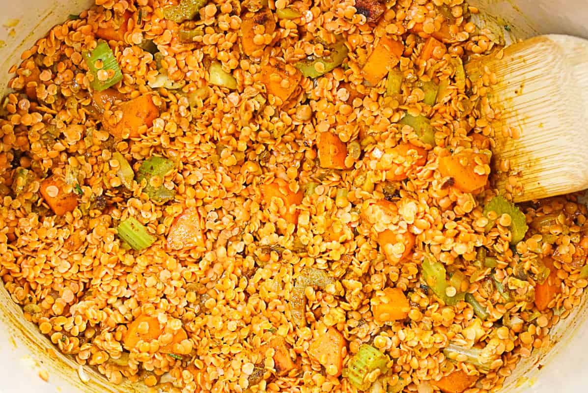 sautéing red lentils and vegetables